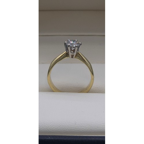 6 - 18ct yellow gold solitaire diamond ring. 0.75ct diamond. Round cut. [Ring size M] [3.71grams]