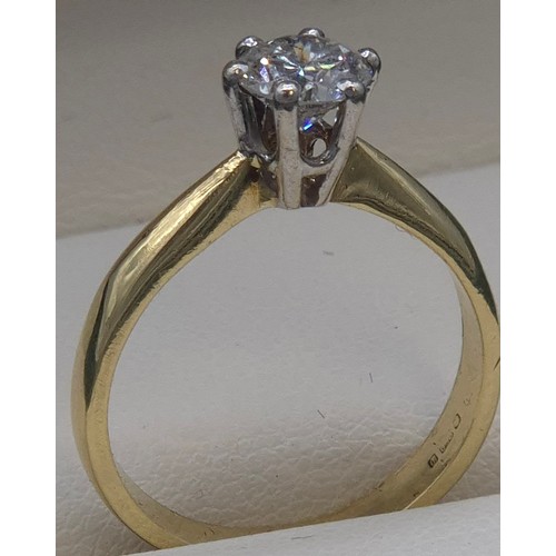 6 - 18ct yellow gold solitaire diamond ring. 0.75ct diamond. Round cut. [Ring size M] [3.71grams]