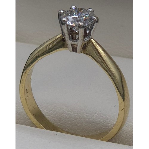 6 - 18ct yellow gold solitaire diamond ring. 0.75ct diamond. Round cut. [Ring size M] [3.71grams]