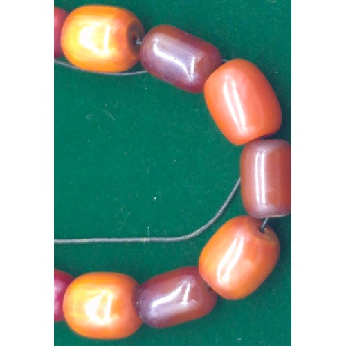 18 - Vintage Amber graduating bead necklace. [134grams]