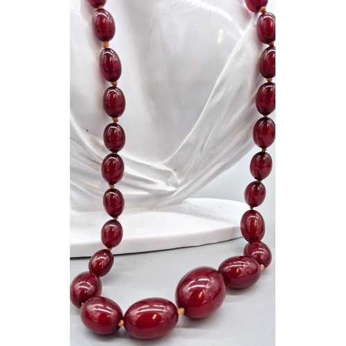 19 - Vintage Cherry Amber Bakelite Graduating bead necklace. [73.26grams]