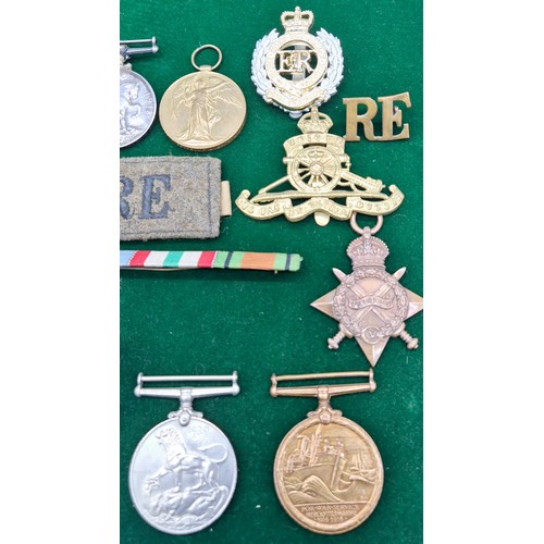 21 - A Selection of military medals and cap badges; WWI Trio medal set belonging to M. Z.47. H BETHELL. A... 