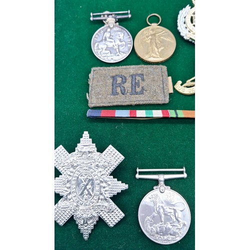 21 - A Selection of military medals and cap badges; WWI Trio medal set belonging to M. Z.47. H BETHELL. A... 