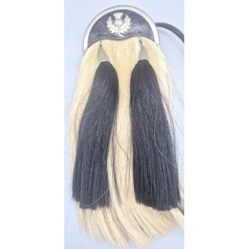 110 - Antique Scottish horse hair sporran. Fitted with a silver plated thistle.