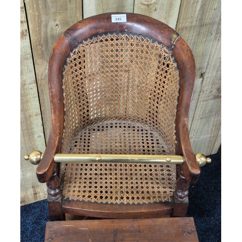 345 - 19th century child's high chair. Bergere tub chair. Brass rod. raised on a square table. Turned legs... 