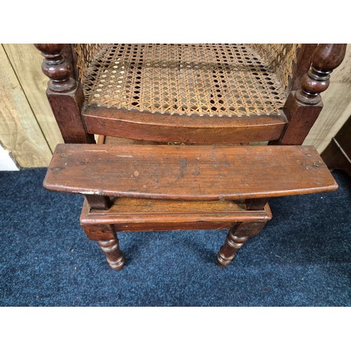 345 - 19th century child's high chair. Bergere tub chair. Brass rod. raised on a square table. Turned legs... 