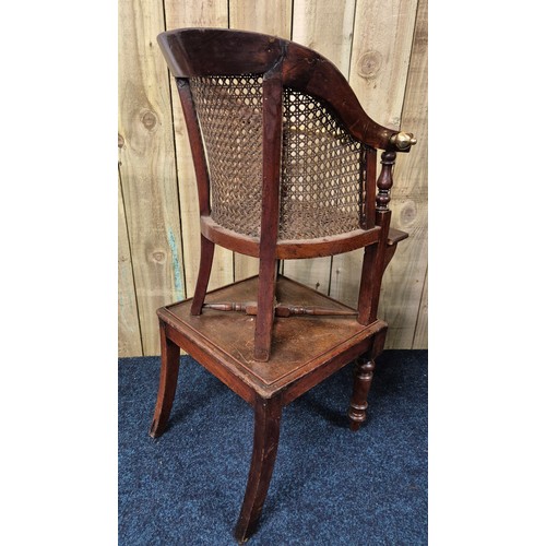 345 - 19th century child's high chair. Bergere tub chair. Brass rod. raised on a square table. Turned legs... 