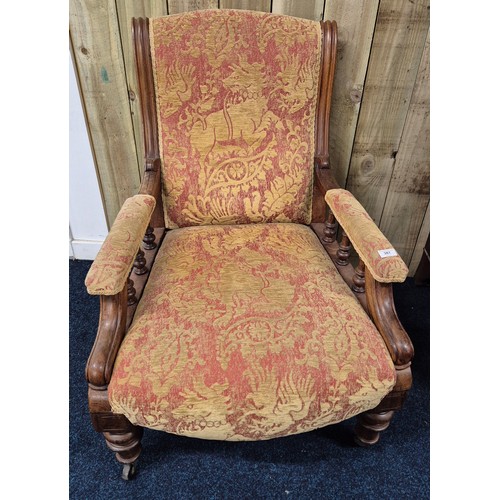 387 - 19th century fireside arm chair.