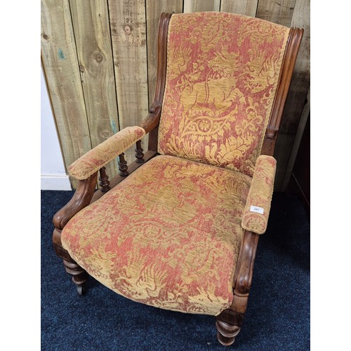 387 - 19th century fireside arm chair.