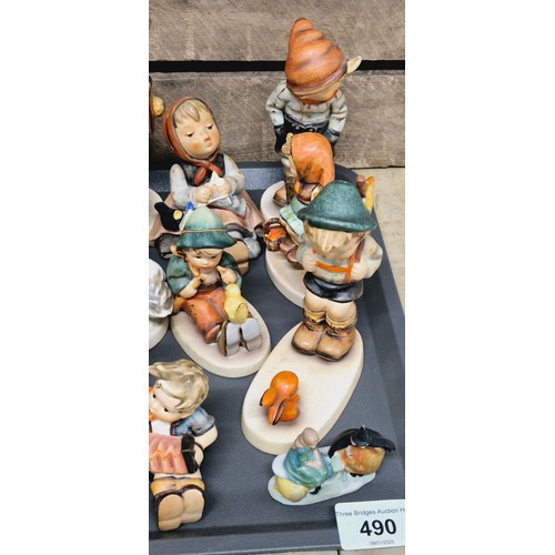 490 - A Tray of collectable German figurines; Hummel figures, German porcelain & others
