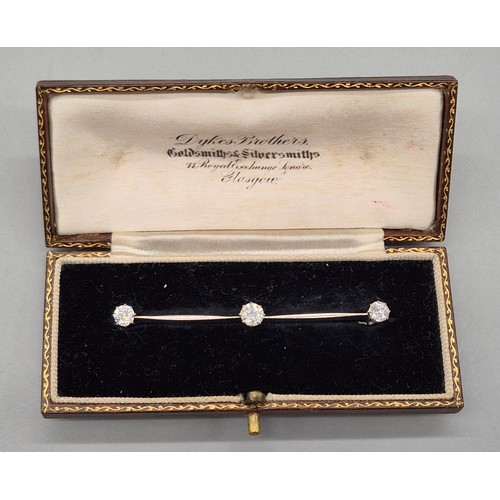 53 - C1930's Platinum and diamond bar brooch. Comes with original box. Approx 1.20cts diamonds. [Centre d... 