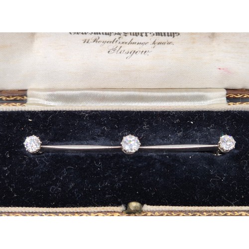 53 - C1930's Platinum and diamond bar brooch. Comes with original box. Approx 1.20cts diamonds. [Centre d... 