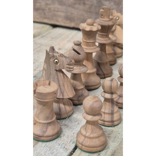 471 - Boxed hand worked wooden chess set [Missing two dark wood pawns]