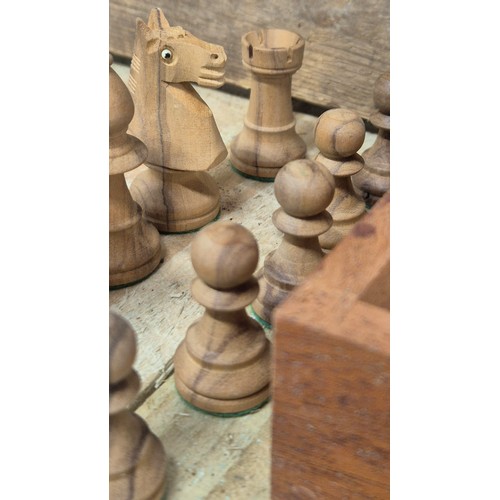 471 - Boxed hand worked wooden chess set [Missing two dark wood pawns]