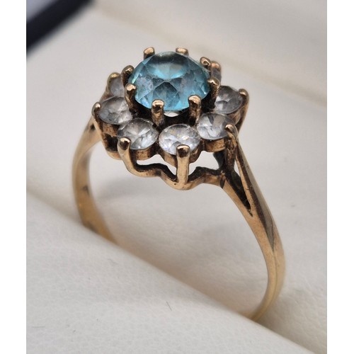 48 - 9ct yellow gold, Aquamarine and white quartz gem stone ring. Large round cut Aquamarine stone surrou... 