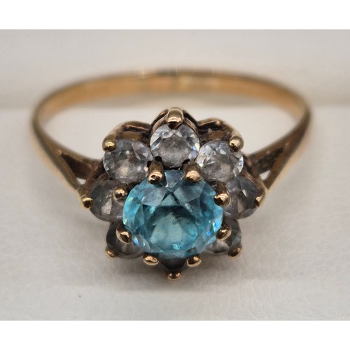 48 - 9ct yellow gold, Aquamarine and white quartz gem stone ring. Large round cut Aquamarine stone surrou... 