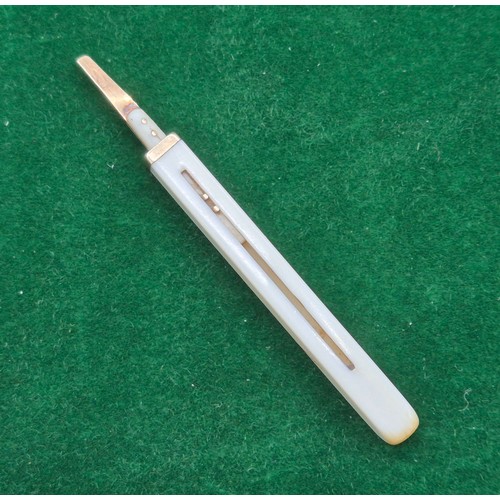 38 - Antique Palmer- Inventor 9ct yellow gold and bone toothpick. [7.5cm length]