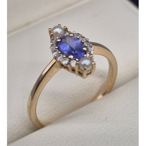 33 - 9ct yellow gold, Purple iolite stone, white quarts stone and seed pearl ring. [Ring size N] [2grams]