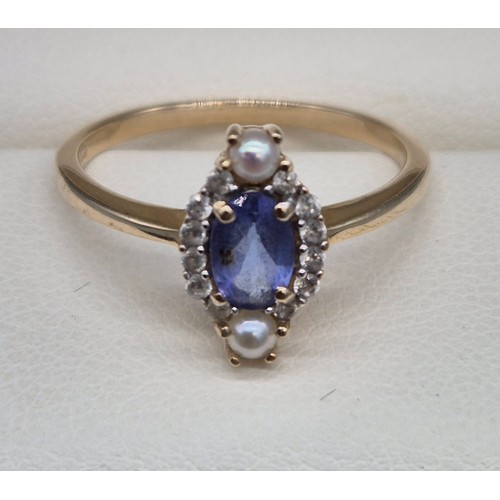 33 - 9ct yellow gold, Purple iolite stone, white quarts stone and seed pearl ring. [Ring size N] [2grams]