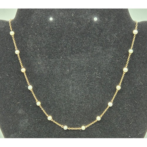 29 - 9ct yellow gold and freshwater pearl necklace. [3.51grams]