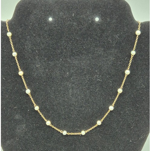 29 - 9ct yellow gold and freshwater pearl necklace. [3.51grams]