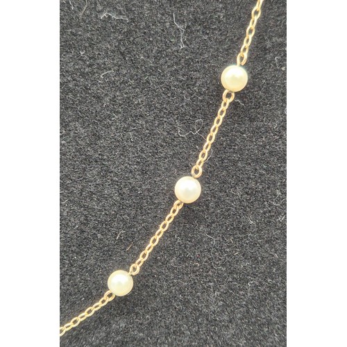 29 - 9ct yellow gold and freshwater pearl necklace. [3.51grams]