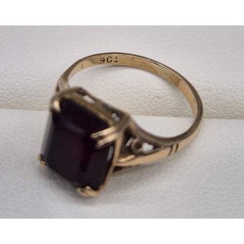 83 - 9ct yellow gold and red glass cut stone. [Ring size I] [2.06GRAMS]