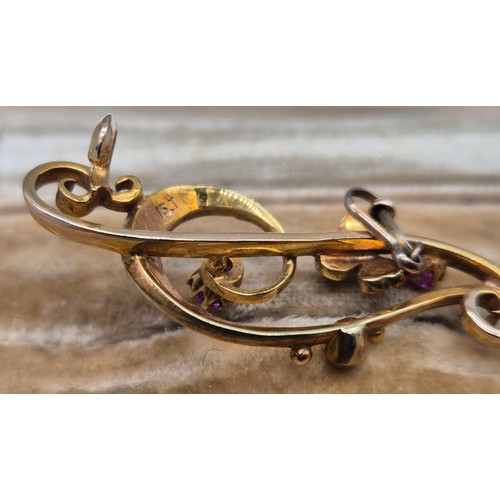 115 - 15ct yellow gold Edwardian bar brooch fitted with two ruby gem stones and seed pearls. Comes with bo... 