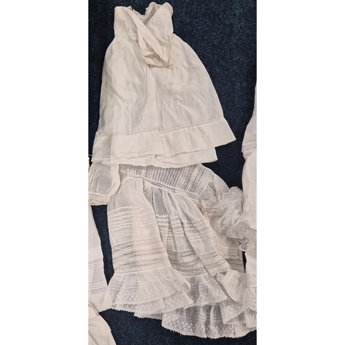 465A - A collection of antique child's christening gowns