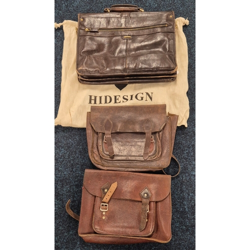 462A - A collection of three antique & vintage leather satchels; Hide sign leather satchel, antique brown l... 