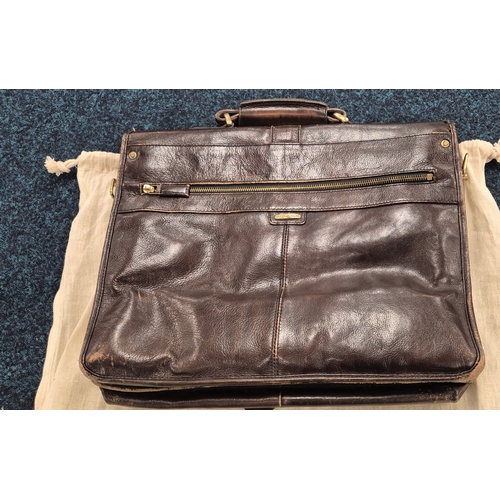 462A - A collection of three antique & vintage leather satchels; Hide sign leather satchel, antique brown l... 