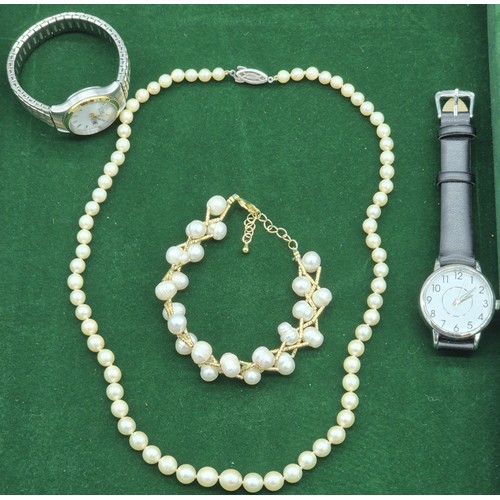 62 - A Selection of jewellery; Citizen Eco- Drive ladies watch, Vintage silver clasp and fresh water pear... 