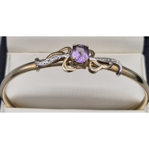 82 - 9ct yellow gold, Amethyst and diamond stone bracelet. [7.20grams]