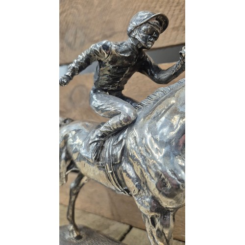 106 - Sheffield Silver hallmarked Sculpture of a jockey and horse. Whip taped to the underside. Makers ini... 