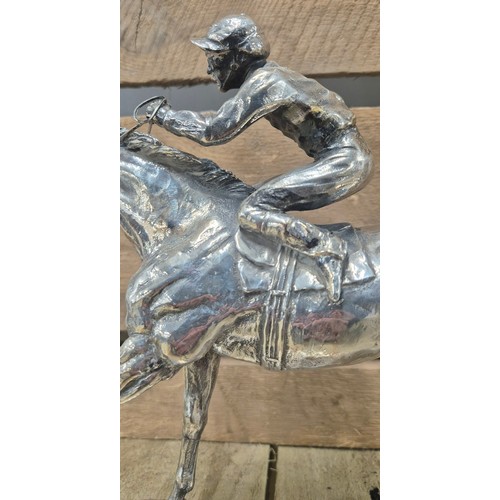 106 - Sheffield Silver hallmarked Sculpture of a jockey and horse. Whip taped to the underside. Makers ini... 