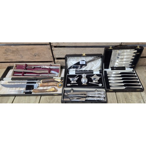 104 - A Collection of Silver plated wares; Silver plated Condiment set, Viners 6 piece knife set, Two Boxe... 