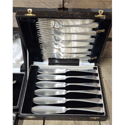 104 - A Collection of Silver plated wares; Silver plated Condiment set, Viners 6 piece knife set, Two Boxe... 