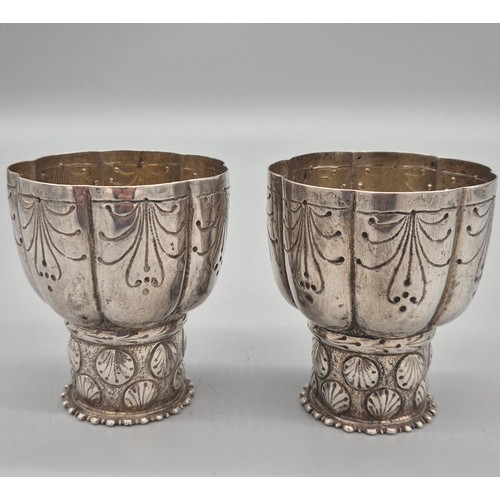 117 - A Pair of engraved Eastern Low Grade Silver Chalices [8.5cm High] [