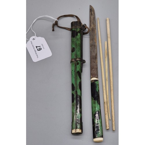 67 - 19th century Chinese Green tortoise shell chopstick set; Fitted with a single blade and bone chopsti... 