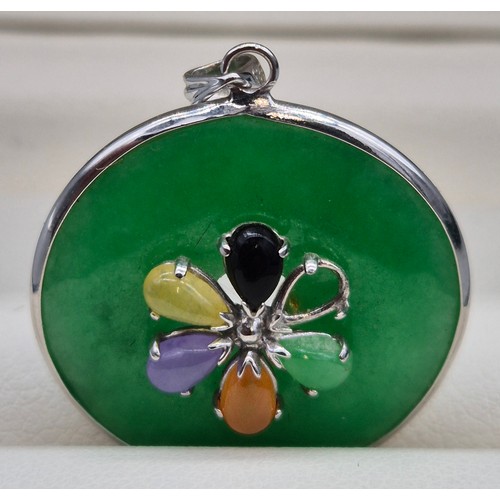 42 - 14ct white gold and jade pendant. Fitted with five various jade pear drop stones. Missing one stone.... 