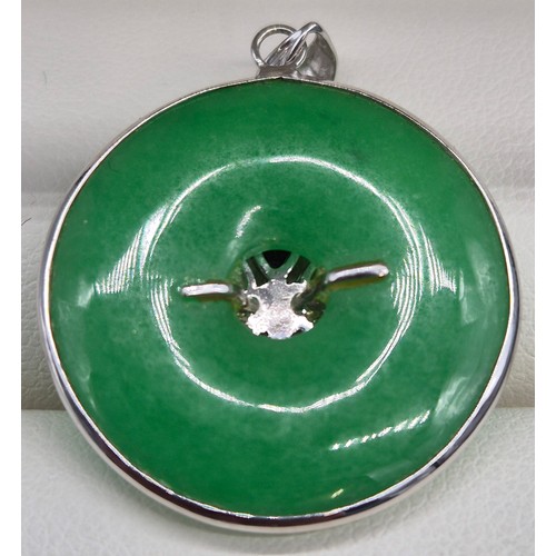 42 - 14ct white gold and jade pendant. Fitted with five various jade pear drop stones. Missing one stone.... 