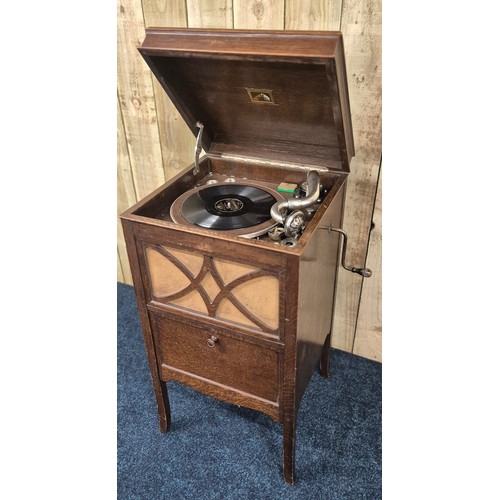 444 - His Masters Voice record player cabinet. Oak cabinet. Plays but mechanism needs attentions. 86x45x43... 