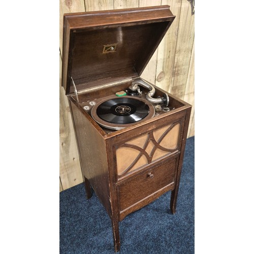 444 - His Masters Voice record player cabinet. Oak cabinet. Plays but mechanism needs attentions. 86x45x43... 