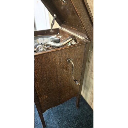 444 - His Masters Voice record player cabinet. Oak cabinet. Plays but mechanism needs attentions. 86x45x43... 