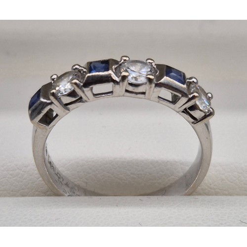 55 - 18ct white gold, sapphire and diamond stone ring. 0.60ct diamonds. Three Emerald cut sapphire gem st... 