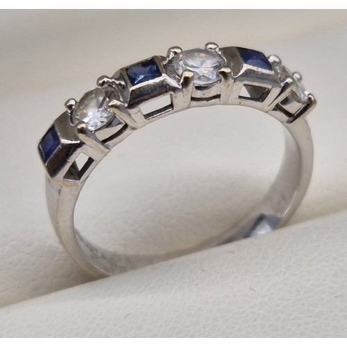 55 - 18ct white gold, sapphire and diamond stone ring. 0.60ct diamonds. Three Emerald cut sapphire gem st... 