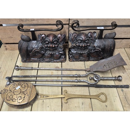 308 - A Pair of 19th century Chinese Rosewood and iron foo dog sculpture- possibly fire side dogs for comp... 