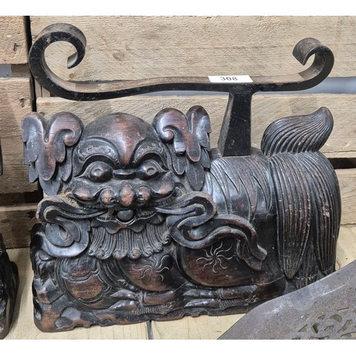 308 - A Pair of 19th century Chinese Rosewood and iron foo dog sculpture- possibly fire side dogs for comp... 