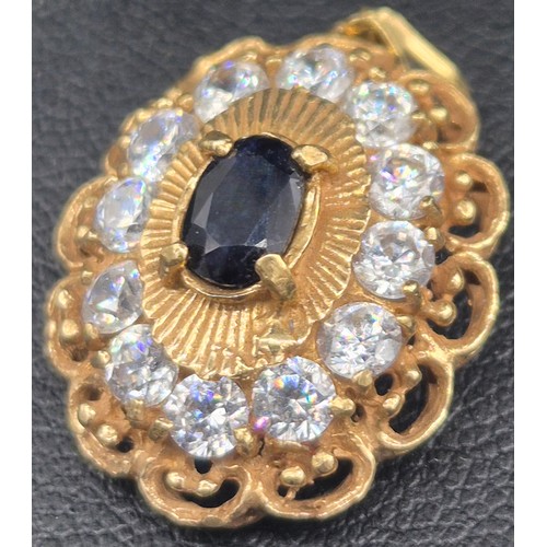 122 - Three various gold pendants with gem stones; 18ct yellow gold, Sapphire and CZ Stone pendant- 3.89gr... 