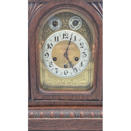 297 - 19th century Walnut cased Junghans Westminster Chime mantle clock. Brass face. 46.5cm high. comes wi... 